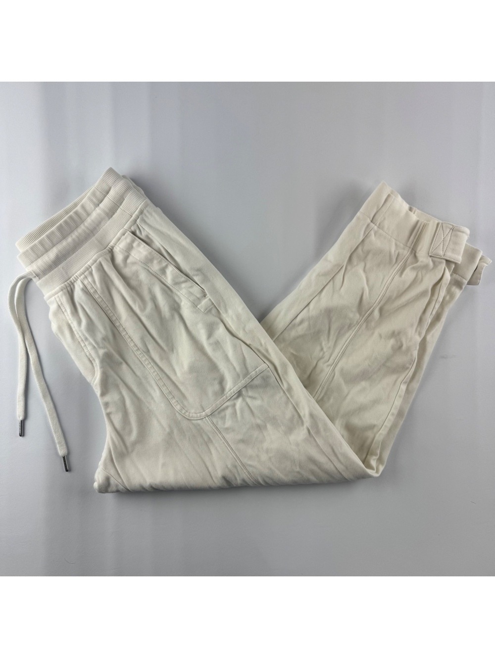 Athleta Women’s Size Small White Joggers with Button Cuffs- Read description